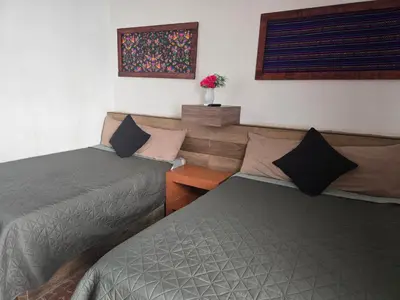 Cama o camas de una habitación en Casa en Centro histórico Alojamiento completo