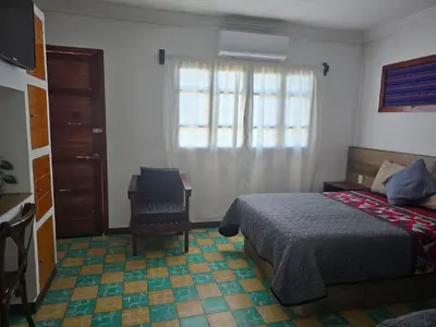 Cama o camas de una habitación en Casa en Centro histórico Alojamiento completo