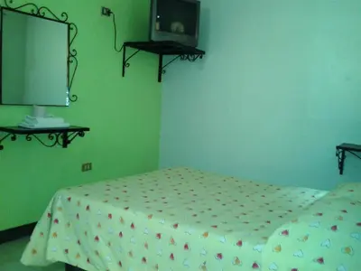 Cama o camas de una habitación en Hotel San Andres