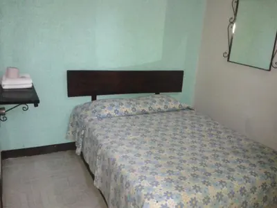 Cama o camas de una habitación en Hotel San Andres