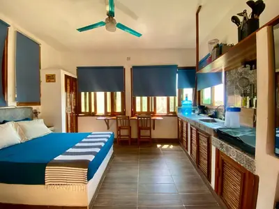 Cama o camas de una habitación en Estudio con vista al mar, AC, WIFI Starlink, Parking