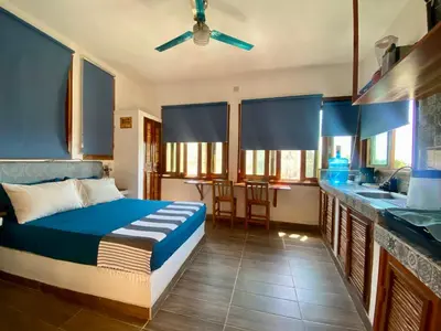 Cama o camas de una habitación en Estudio con vista al mar, AC, WIFI Starlink, Parking