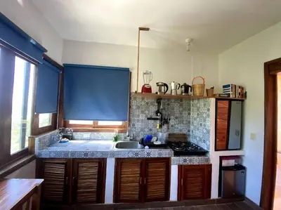 Una cocina o zona de cocina en Estudio con vista al mar, AC, WIFI Starlink, Parking
