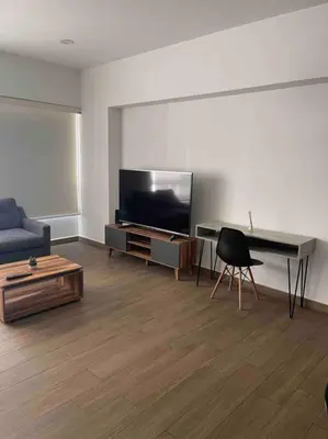 Una televisión o centro de entretenimiento en Condo cerca de Azteca, UNAM,hospitales 7 PAX