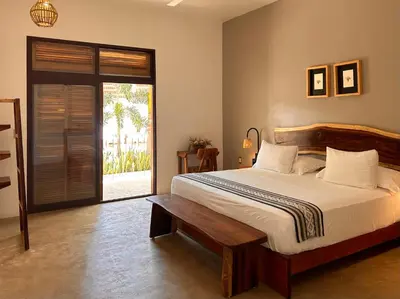 Cama o camas de una habitación en Hotelito Zicatela