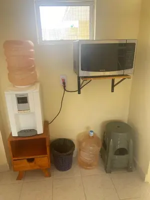 Una televisión o centro de entretenimiento en Hostal Las Quince Letras