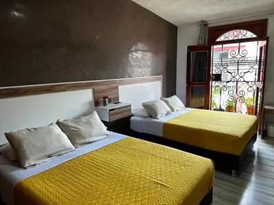Cama o camas de una habitación en Casa Marin Framboyan