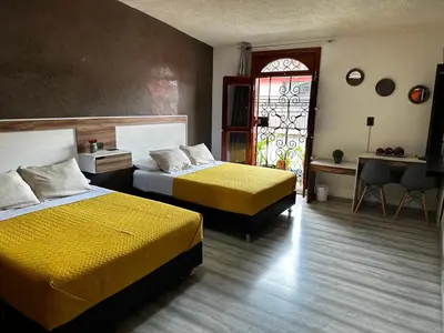 Cama o camas de una habitación en Casa Marin Framboyan