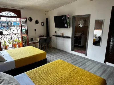Cama o camas de una habitación en Casa Marin Framboyan