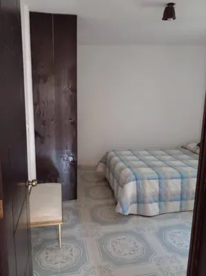 Cama o camas de una habitación en CASA ACOGEDORA
