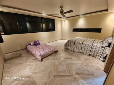 Cama o camas de una habitación en Casa Beily con alberca climatizada