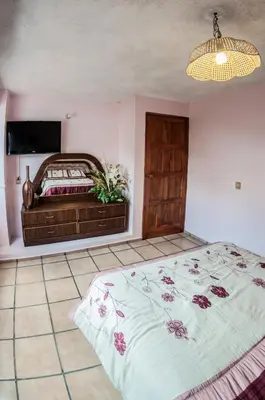Cama o camas de una habitación en Hotel Michelle
