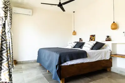 Cama o camas de una habitación en Casa Teotl Puerto Escondido