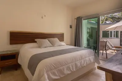 Cama o camas de una habitación en PETRAS HOTEL