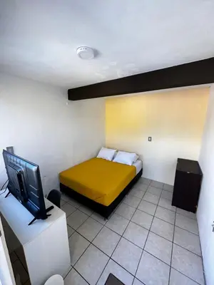 Cama o camas de una habitación en CASA MARIN MANDIMBO