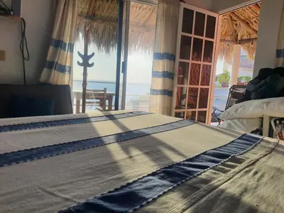Cama o camas de una habitación en Bungalow Maya Luna