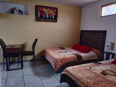 Cama o camas de una habitación en Hospedaje San Francisco.6 personas