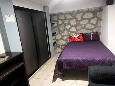Cama o camas de una habitación en Departamento de Cantera