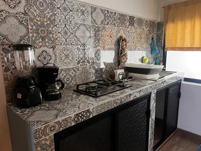 Una cocina o zona de cocina en Departamento de Cantera