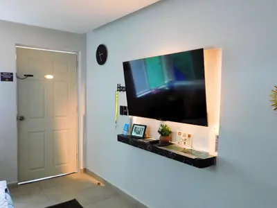 Una televisión o centro de entretenimiento en Depa privado Estadio GNP -Foro Sol-, Palacio de los Deportes