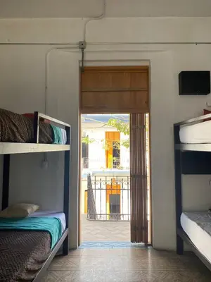 Cama o camas de una habitación en Choco Hostel