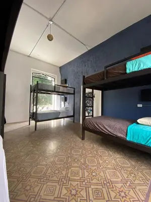 Cama o camas de una habitación en Choco Hostel
