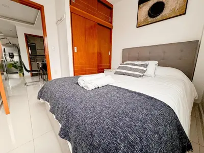 Cama o camas de una habitación en Beautiful Apartment, Airport, Downtown, Foro Sol
