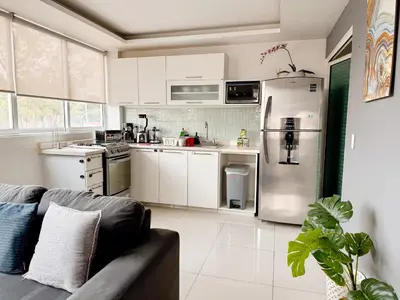 Una cocina o zona de cocina en Beautiful Apartment, Airport, Downtown, Foro Sol