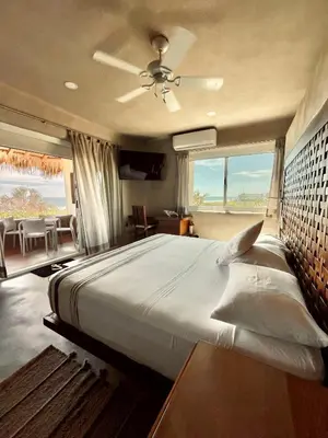 Cama o camas de una habitación en El Origen Villas & Spa-Puerto Escondido