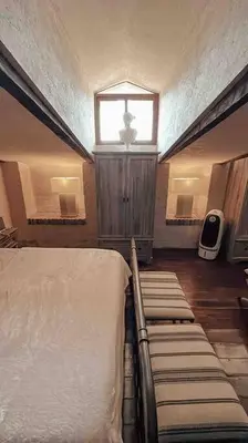 Cama o camas de una habitación en TRASTEVERE