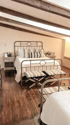 Cama o camas de una habitación en TRASTEVERE