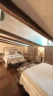 Cama o camas de una habitación en TRASTEVERE