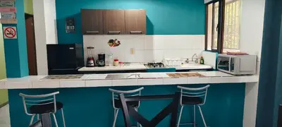 Una cocina o zona de cocina en Departamento Familiar Escorpións