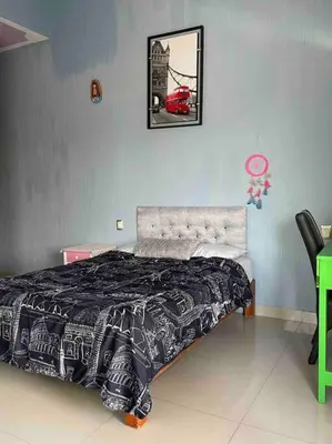 Cama o camas de una habitación en Casa Emilia