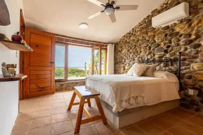 Cama o camas de una habitación en CasaPiedra