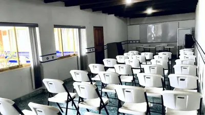 Una televisión o centro de entretenimiento en Hostal Plaza Central