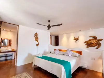 Cama o camas de una habitación en Punta Arena Surf Suites