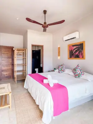 Cama o camas de una habitación en Punta Arena Surf Suites