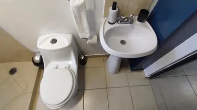 Un baño de Depa Balcones cerca Estadio GNP, Palacio de los Deportes, Autódromo HR y Aeropuerto CDMX