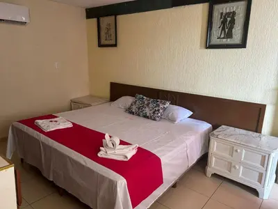 Cama o camas de una habitación en Hotel Capri Playa a una calle de la Playa Regatas
