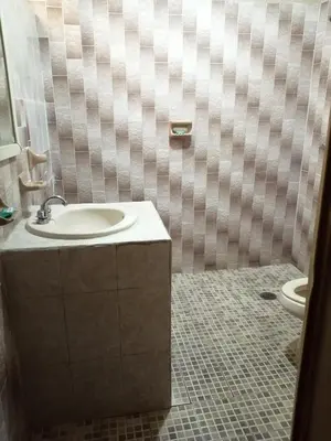 Un baño de Hotel Delfines Del Mar