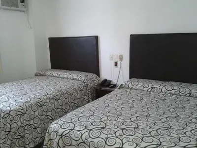Cama o camas de una habitación en Hotel Real del Mar