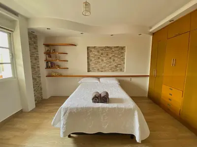 Cama o camas de una habitación en Ubicación top: Depto. a 3 min de la playa