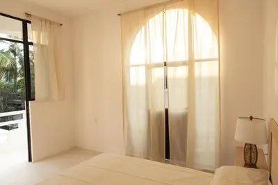 Cama o camas de una habitación en La Punta Rooms