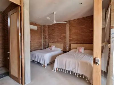 Cama o camas de una habitación en Casa Kava - Estilo y vibra en Puerto Escondido