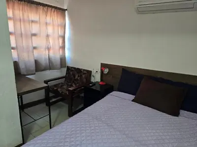 Cama o camas de una habitación en Habitación 2 climatizada cerca de IMSS UMAE