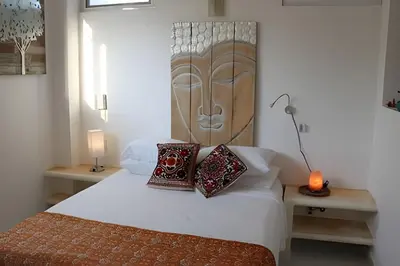 Cama o camas de una habitación en Valentina Salchi A Playas vírgenes Internet veloz