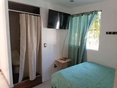 Cama o camas de una habitación en Habitacion Amueblada Independiente