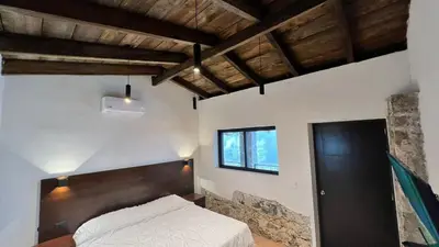 Cama o camas de una habitación en La Peña Hotel Boutique & SPA