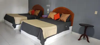 Cama o camas de una habitación en Hotel NUDISTA - Luz de Luna NUDE